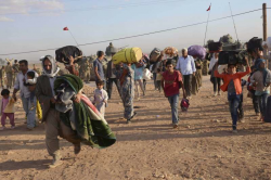 Des Kurdes syriens après la traversée de la frontière vers la province de Sanliurfa en Turquie. © Reuters Des Kurdes syriens après la traversée de la frontière vers la province de Sanliurfa en Turquie. © Reuters