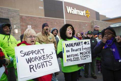 Piquet de grève devant un magasin Walmart (Photo John Gress / Reuters)