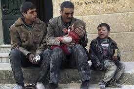 Survivants d&#039;un bombardement à Alep, février 2014