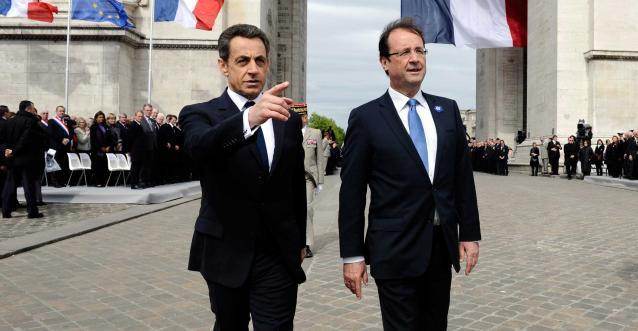 Nicolas Sarkozy et François Hollande ensemble aux commémorations du 8 mai 2012. Nicolas Sarkozy et François Hollande ensemble aux commémorations du 8 mai 2012.