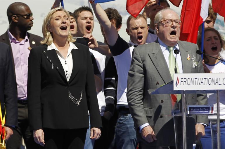 Sur l'estrade du 1er-Mai du FN, en 2012. Sur l'estrade du 1er-Mai du FN, en 2012.