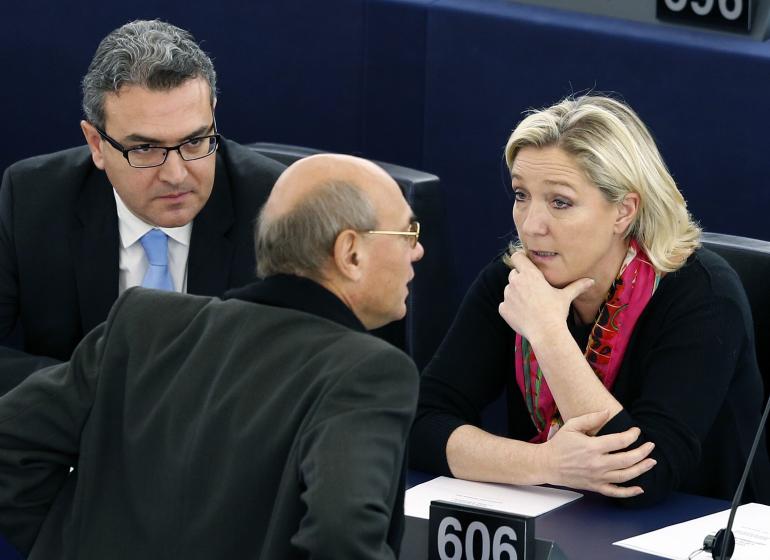 Aymeric Chauprade, Jean-Luc Schaffhauser et Marine Le Pen au parlement européen, le 27 novembre 2014. Aymeric Chauprade, Jean-Luc Schaffhauser et Marine Le Pen au parlement européen, le 27 novembre 2014.