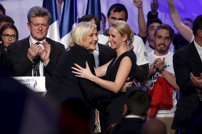 Marine Le Pen et Marion Maréchal-Le Pen, en meeting à Paris, le 17 décembre. © Reuters Marine Le Pen et Marion Maréchal-Le Pen, en meeting à Paris, le 17 décembre. © Reuters
