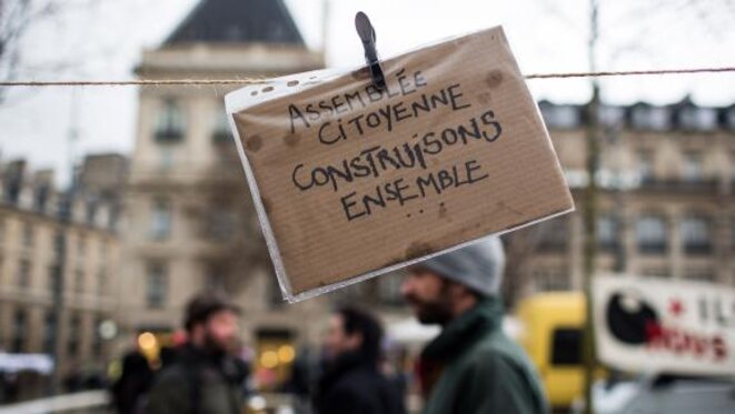 Pancarte sur le site de la "Nuit Debout", place de la République à Paris, le 31 mars 2016 © REVELLI-BEAUMONT / SIPA Pancarte sur le site de la "Nuit Debout", place de la République à Paris, le 31 mars 2016 © REVELLI-BEAUMONT / SIPA