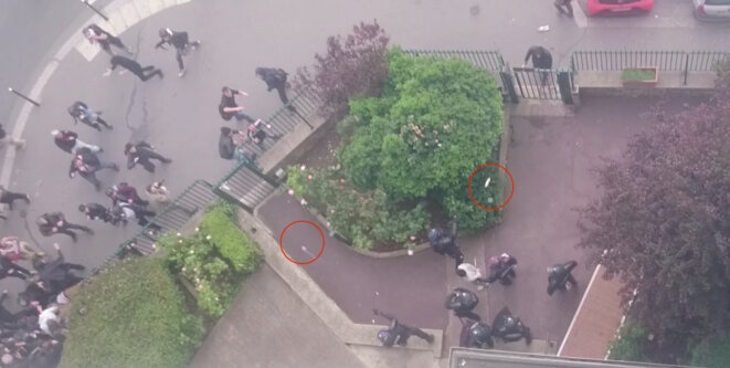 Les policiers lancent deux nouvelles grenades pour éloigner la foule, l'une d'elles à proximité du blessé © Video Claire Ernzen