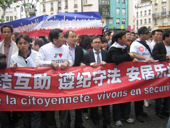 La communauté chinoise défile, excédée par le racisme et la violence