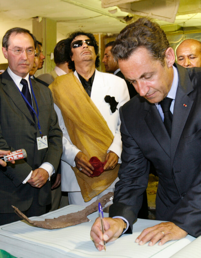 Claude Guéant (left), Muammar Gaddafi and Nicolas Sarkozy during the latter's trip to Tripoli in July 2007, two months after his election. © Reuters Claude Guéant (left), Muammar Gaddafi and Nicolas Sarkozy during the latter's trip to Tripoli in July 2007, two months after his election. © Reuters