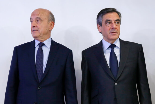 Alain Juppé et François Fillon au siège de la Haute autorité de la primaire, le 27 novembre au soir. © Reuters Alain Juppé et François Fillon au siège de la Haute autorité de la primaire, le 27 novembre au soir. © Reuters