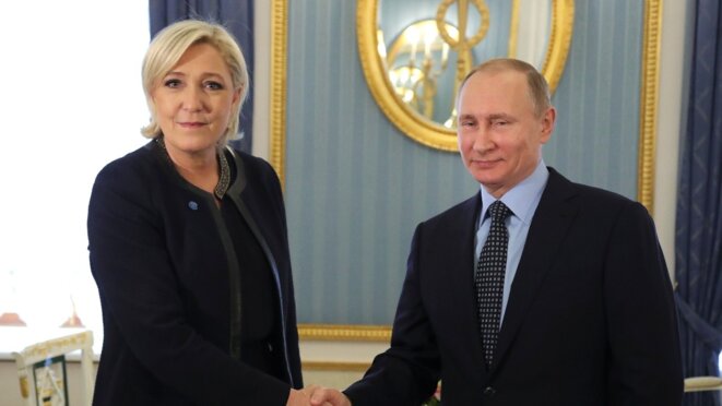 Marine Le Pen et Vladimir Poutine lors de leur entretien, le 24 mars 2017 à Moscou. © Reuters Marine Le Pen et Vladimir Poutine lors de leur entretien, le 24 mars 2017 à Moscou. © Reuters