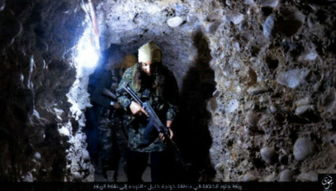 A jihadist in a tunnel underneath the former Islamic State-held city of Mosul.