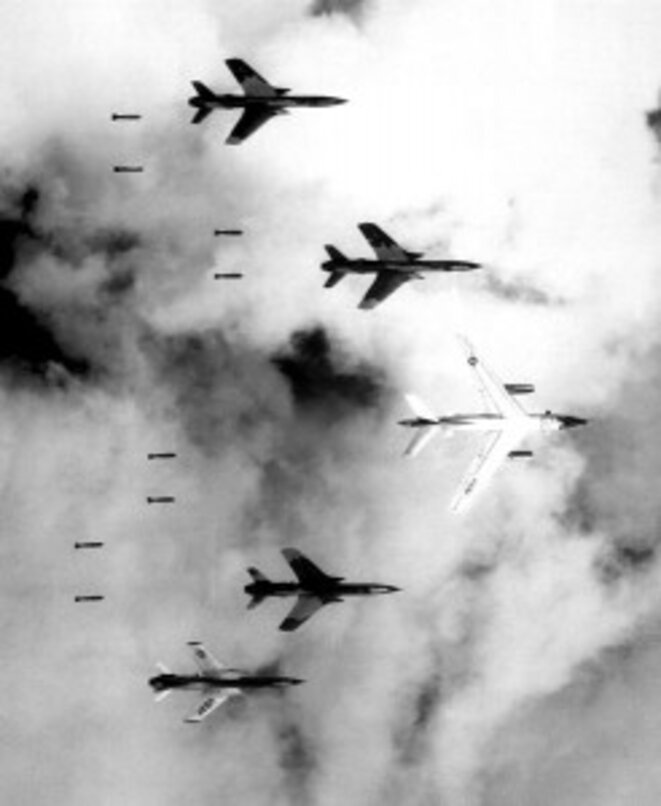 Air Force F-105s bomb a target in the southern panhandle of North Vietnam on June 14, 1966. (Photo credit: U.S. Air Force)” Air Force F-105s bomb a target in the southern panhandle of North Vietnam on June 14, 1966. (Photo credit: U.S. Air Force)”