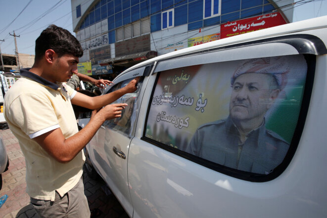 Une affiche avec le portrait de Massoud Barzani appelant à voter en faveur du référendum le 25 septembre 2017. © Reuters Une affiche avec le portrait de Massoud Barzani appelant à voter en faveur du référendum le 25 septembre 2017. © Reuters