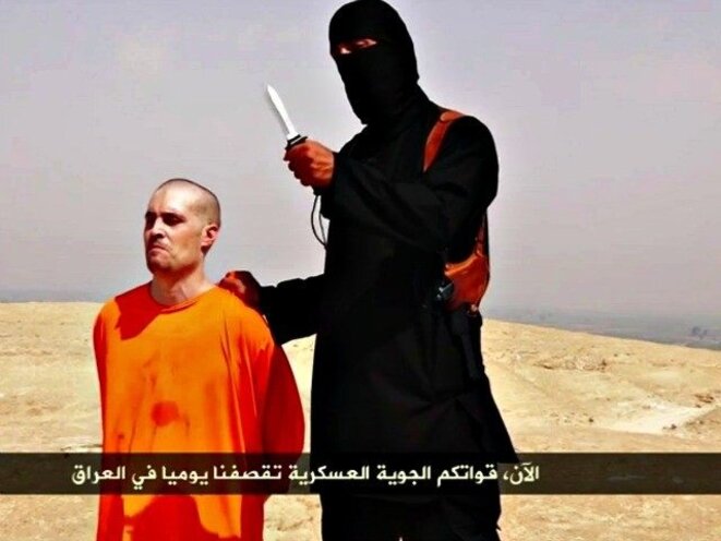 L’un des hommes représentés sur les images diffusées cette semaine par The Telegraph est Mohammed Emwazi, alias Jihadi John, qui a procédé à des atrocités pour des vidéos de propagande. L’un des hommes représentés sur les images diffusées cette semaine par The Telegraph est Mohammed Emwazi, alias Jihadi John, qui a procédé à des atrocités pour des vidéos de propagande.