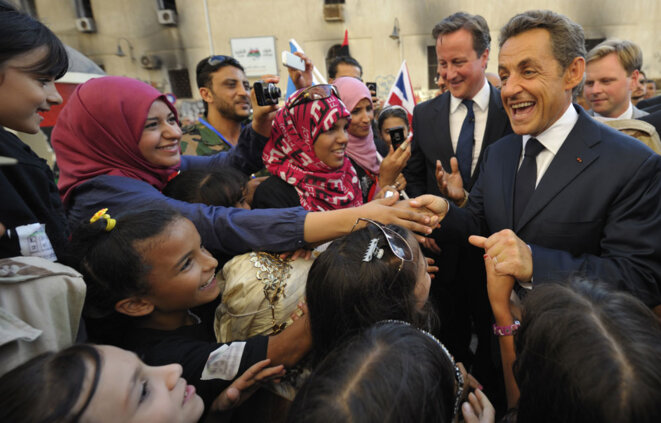 Nicolas Sarkozy et David Cameron célébrant la victoire à Benghazi, en septembre 2011 © Reuters Nicolas Sarkozy et David Cameron célébrant la victoire à Benghazi, en septembre 2011 © Reuters
