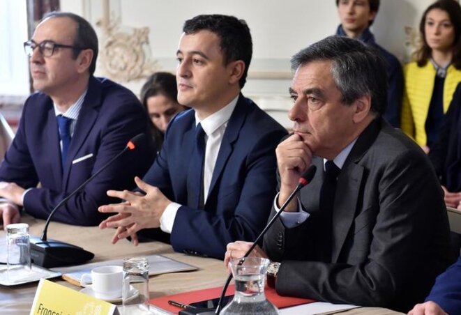 G. Darmanin et F. Fillon lors d'une réunion publique à Tourcoing, pendant la campagne présidentielle, le 17 février 2017. © Reuters G. Darmanin et F. Fillon lors d'une réunion publique à Tourcoing, pendant la campagne présidentielle, le 17 février 2017. © Reuters