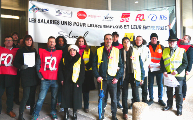 Les membres de l'intersyndicale SoLocal, le 9 mars à La Défense. Les membres de l'intersyndicale SoLocal, le 9 mars à La Défense.