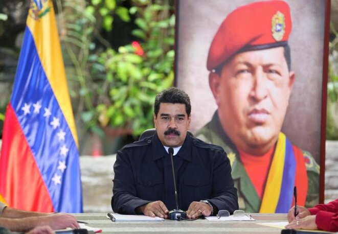 Nicolás Maduro devant un portrait de Hugo Chávez. © Reuters Nicolás Maduro devant un portrait de Hugo Chávez. © Reuters