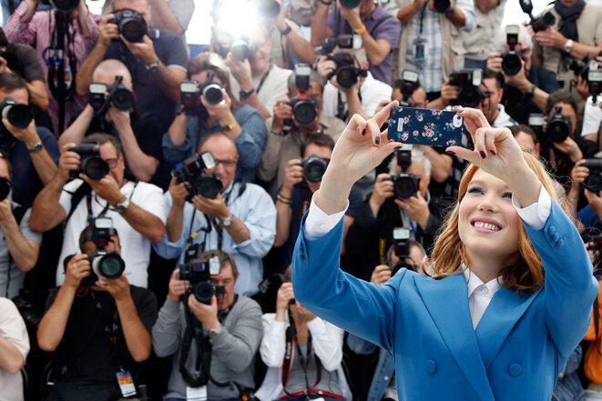 Authorised: French actress Léa Seydoux takes a selfie at the 2014 Cannes Film Festival. © Reuters Authorised: French actress Léa Seydoux takes a selfie at the 2014 Cannes Film Festival. © Reuters