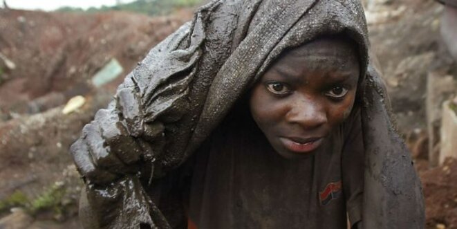 jeune garçon travaillant dans une mine au sud-est de la RDC, SCHALK VAN ZUYDAM/AP/SIPA jeune garçon travaillant dans une mine au sud-est de la RDC, SCHALK VAN ZUYDAM/AP/SIPA