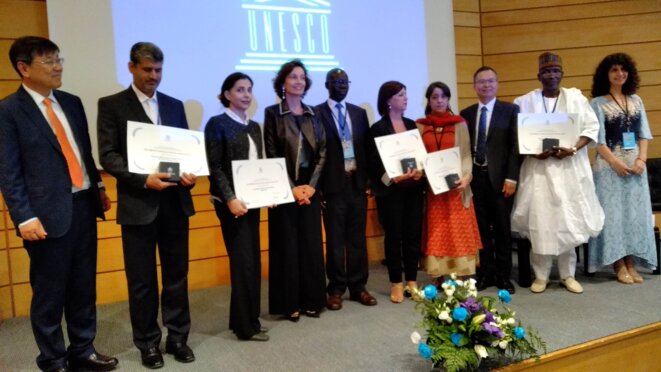 La photo de famille autour de Mme Audrey Azoulay, Directrice générale de l'UNESCO La photo de famille autour de Mme Audrey Azoulay, Directrice générale de l'UNESCO