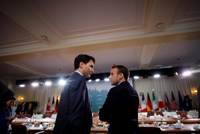 Justin Trudeau et Emmanuel Macron le 9 juin 2018 au G-7 de Charlevoix au Québec © Reuters. Justin Trudeau et Emmanuel Macron le 9 juin 2018 au G-7 de Charlevoix au Québec © Reuters.