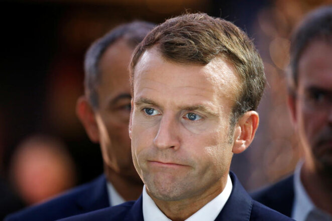 Emmanuel Macron lors de sa visite au salon de l'automobile, à Paris, le 3 octobre 2018. PHOTO Regis Duvignau/REUTERS