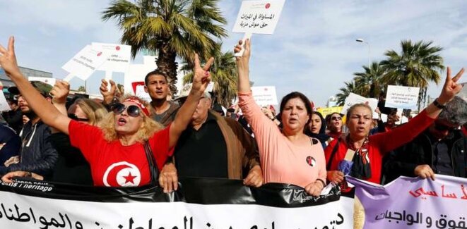 Marche pour l'égalité entre les femmes et les hommes à Tunis, en mars 2018. © Reuters Marche pour l'égalité entre les femmes et les hommes à Tunis, en mars 2018. © Reuters