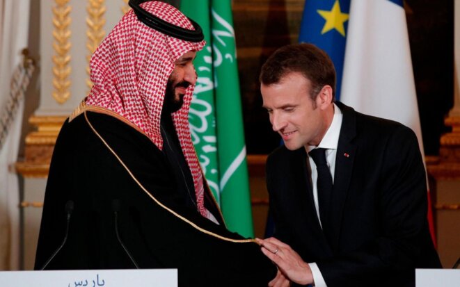 Mohamed ben Salmane et Emmanuel Macron  à l'Elysée. AFP PHOTO / POOL / YOAN VALAT