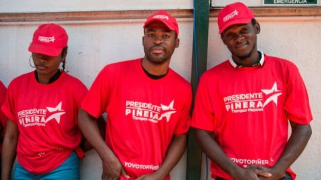 Parte de la comunidad haitiana en Chile apoyó a Piñera durante la campaña electoral de las presidenciales celebradas el año pasado. Ahora reciben "el pago de Chile".... © AFP Parte de la comunidad haitiana en Chile apoyó a Piñera durante la campaña electoral de las presidenciales celebradas el año pasado. Ahora reciben "el pago de Chile".... © AFP