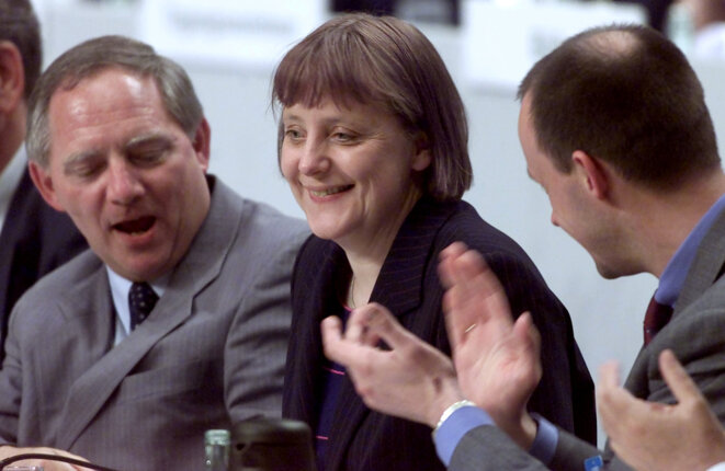 Wolfgang Schäuble, Angela Merkel et Friedrich Merz, à l'époque. © Reuters Wolfgang Schäuble, Angela Merkel et Friedrich Merz, à l'époque. © Reuters