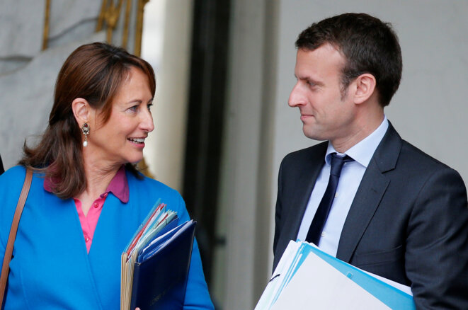 Ségolène Royal, alors ministre de l'écologie, et Emmanuel Macron, alors ministre de l'économie en 2016. © Reuters