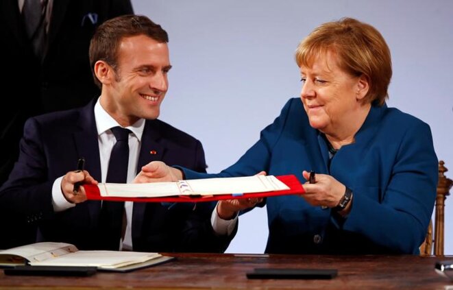 Emmanuel Macron et Angela Merkel à Aix-la-Chapelle, le 22 janvier. © Reuters Emmanuel Macron et Angela Merkel à Aix-la-Chapelle, le 22 janvier. © Reuters