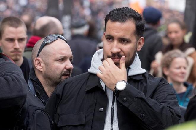 Alexandre Benalla et, au second plan, Vincent Crase, le 1er mai 2018, à Paris. © Reuters