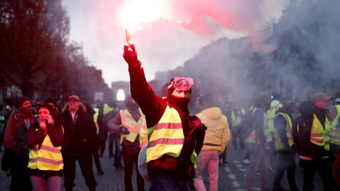 Manifestation des gilets jaunes sur les Champs Élysées le 24 novembre 2018 © Reuters Manifestation des gilets jaunes sur les Champs Élysées le 24 novembre 2018 © Reuters