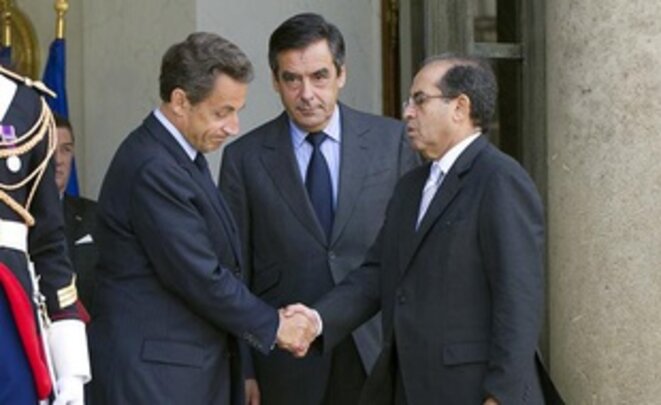 Mahmoud Jibril, Nicolas Sarkozy et François Fillon à l'issue de leur rencontre le 14 mai 2011 à l'Elysée — BERTRAND LANGLOIS/AFP Mahmoud Jibril, Nicolas Sarkozy et François Fillon à l'issue de leur rencontre le 14 mai 2011 à l'Elysée — BERTRAND LANGLOIS/AFP