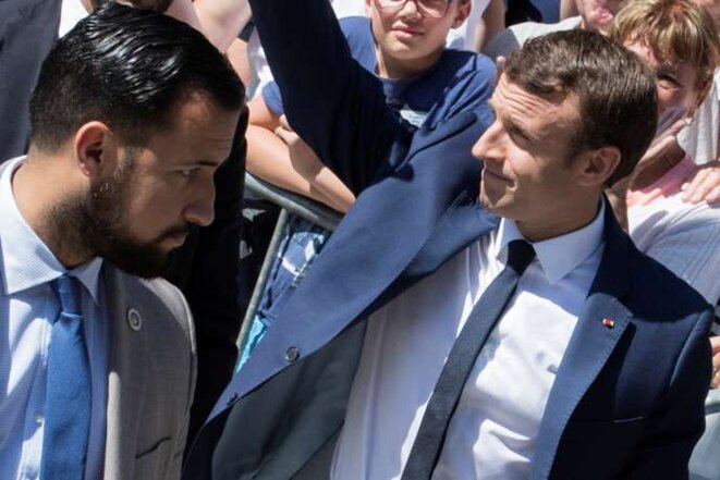 Alexandre Benalla and Emmanuel Macron at Le Touquet in northern France in June 2017. © Philippe Wojazer / Reuters