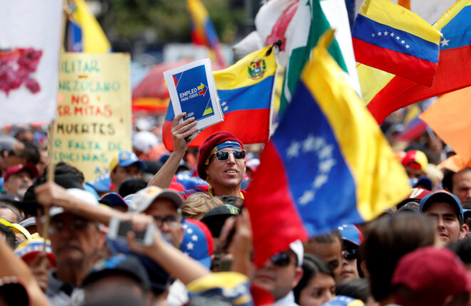 Des opposants à Nicolas Maduro le 12 février 2019 à Caracas © Carlos Garcia Rawlins / Reuters. Des opposants à Nicolas Maduro le 12 février 2019 à Caracas © Carlos Garcia Rawlins / Reuters.