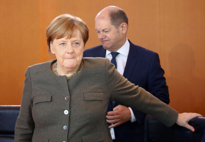 Angela Merkel et son ministre des finances Olaf Scholz. © Reuters Angela Merkel et son ministre des finances Olaf Scholz. © Reuters