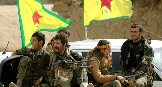 Membres des Unités de protection du peuple (YPG) Membres des Unités de protection du peuple (YPG)