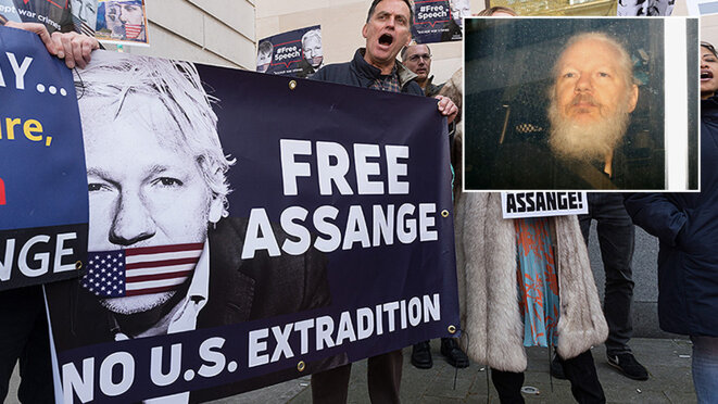 Un manifestant tient une pancarte pour la libération de Julian Assange, devant la Cour de Westminster, le 2 mai à Londres. © © Global Look Press / /ZUMAPRESS.com / Wiktor Szymanowicz; © REUTERS/Henry Nicholls