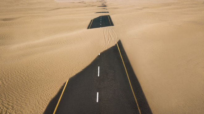 canva-birds-eye-view-photography-of-road-in-the-middle-of-desert2