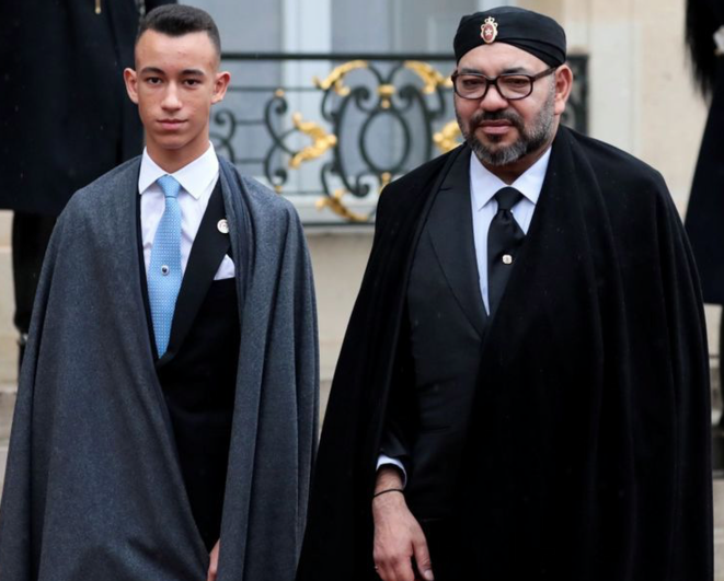 Moroccan King Mohammed VI (r) with his son Moulay Hassan during Armistice Day commemorations in Paris in November 2018. © Reuters