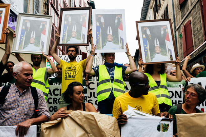 A protest involving portraits of President Emmanuel Macron held at Bayonne near the G7 summit on August 25th 2019. © Yann Levy / Hans Lucas