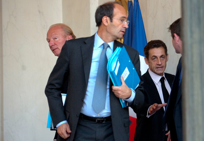Eric Woerth, Brice Hortefeux et Nicolas Sarkozy. © Reuters