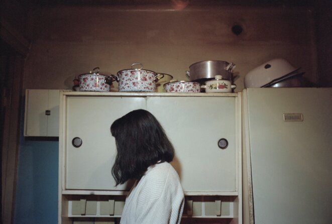 Olessia Venediktova, Brunette woman with pots in the background, Tbilisi, Georgia, 2015, from the series Forget Them © Olessia Venediktova Olessia Venediktova, Brunette woman with pots in the background, Tbilisi, Georgia, 2015, from the series Forget Them © Olessia Venediktova