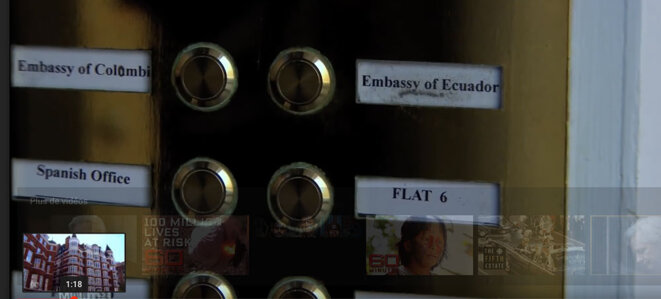 Ecuadorian and Colombian embassy entrance in London. Few years ago. Video screenshot. "Flat 4" is now written instead of Spanish Office. Ecuadorian and Colombian embassy entrance in London. Few years ago. Video screenshot. "Flat 4" is now written instead of Spanish Office.