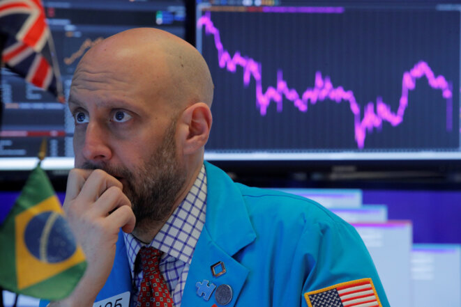 Un trader au New york Stock Exchange, le 24 février. © Reuters Un trader au New york Stock Exchange, le 24 février. © Reuters