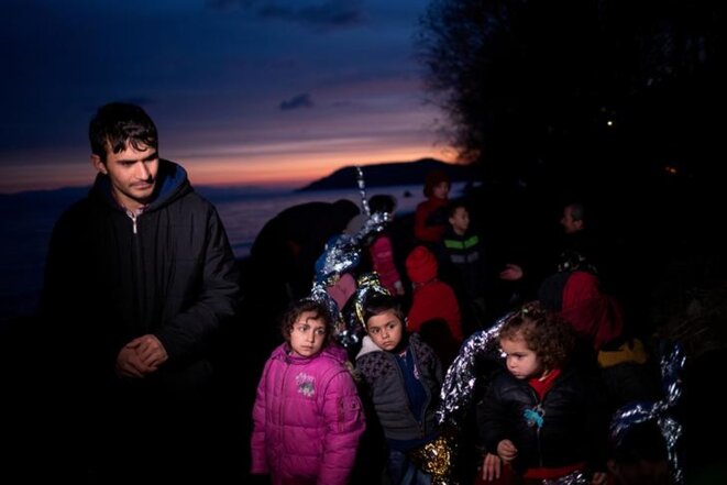 Une famille de réfugiés afghans sur une plage de Skala Sikamias (Grèce), le 1er mars. © Reuters Une famille de réfugiés afghans sur une plage de Skala Sikamias (Grèce), le 1er mars. © Reuters