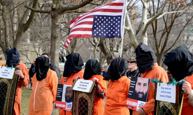 Manifestation contre le camp de Guantanamo à Washington le 11 janvier 2020. © Mike Theiler / Reuters Manifestation contre le camp de Guantanamo à Washington le 11 janvier 2020. © Mike Theiler / Reuters