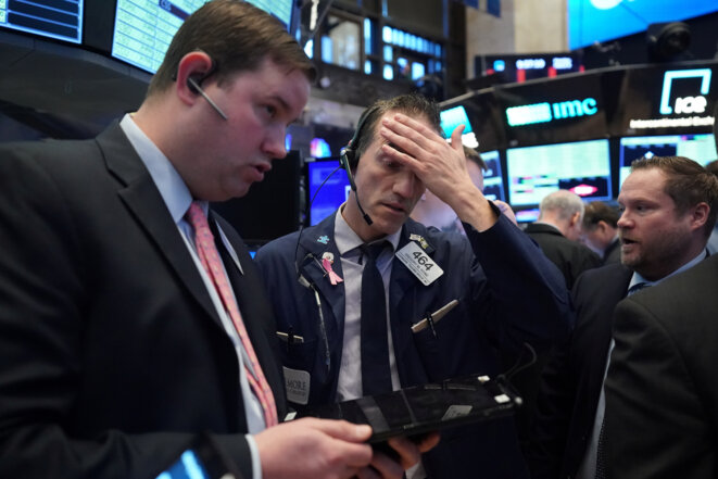 Au New York Stock Exchange le 9 mars. © Reuters Au New York Stock Exchange le 9 mars. © Reuters